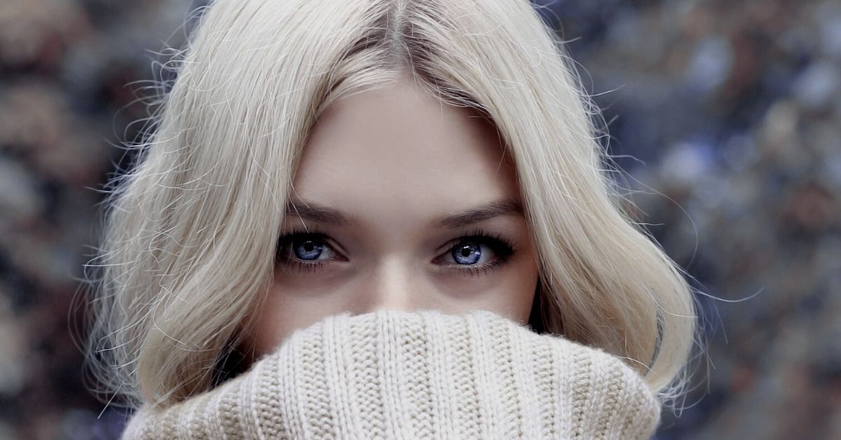 Life-like portrait of a pretty swedish blonde girl with big eyes